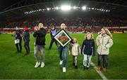 9 December 2023; Recently retired Munster players Andrew Conway, left, and Keith Earls, accompanied by his daughters Ella-May, Laurie and Emie, are introduced to the crowd at half-time during the Investec Champions Cup Pool 3 Round 1 match between Munster and Aviron Bayonnais at Thomond Park in Limerick. Photo by Brendan Moran/Sportsfile
