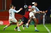 9 December 2023; Cheikh Tiberghien of Aviron Bayonnais, right, is tackled by John Hodnett of Munster during the Investec Champions Cup Pool 3 Round 1 match between Munster and Aviron Bayonnais at Thomond Park in Limerick. Photo by Brendan Moran/Sportsfile