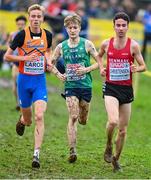 10 December 2023; Nicholas Griggs of Ireland, centre, competes alongside Niels Laros of Netherlands, left, and Axel Vang Christensen of Denmark in the U20 men's 5000m during the SPAR European Cross Country Championships at Laeken Park in Brussels, Belgium. Photo by Sam Barnes/Sportsfile