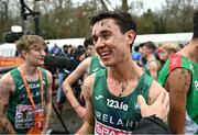 10 December 2023; Jonas Stafford of Ireland celebrates after Ireland won team gold in the U20 men's 5000m during the SPAR European Cross Country Championships at Laeken Park in Brussels, Belgium. Photo by Sam Barnes/Sportsfile