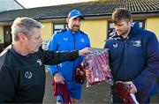 10 December 2023; As part of the club’s 12 County Tour, Leinster Rugby players Jack Conan and Ross Byrne visited Roscrea RFC for their minis’ Christmas Party. Pictured is Roscrea RFC minis coordinator Declan Maloney presenting Ross Byrne a Roscrea RFC jersey at Roscrea RFC in Tipperary. Photo by Tyler Miller/Sportsfile
