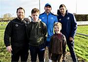 10 December 2023; As part of the club’s 12 County Tour, Leinster Rugby players Jack Conan and Ross Byrne visited Roscrea RFC for their minis’ Christmas Party. Pictured are Jack Conan and Ross Byrne with supporters from left, Ger, Sean, and Cillian Stone at Roscrea RFC in Tipperary. Photo by Tyler Miller/Sportsfile