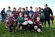 10 December 2023; As part of the club’s 12 County Tour, Leinster Rugby players Jack Conan and Ross Byrne visited Roscrea RFC for their minis’ Christmas Party. Pictured are the Roscrea RFC u11s team with a balls signed by Jack Conan and Ross Byrne at Roscrea RFC in Tipperary. Photo by Tyler Miller/Sportsfile
