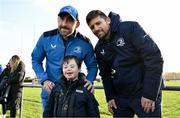 10 December 2023; As part of the club’s 12 County Tour, Leinster Rugby players Jack Conan and Ross Byrne visited Roscrea RFC for their minis’ Christmas Party. Pictured are is Jack Conan and Ross Byrne taking a photograph with supporter Adam Bergin Brady at Roscrea RFC in Tipperary. Photo by Tyler Miller/Sportsfile