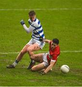 10 December 2023; Niall Geaney of Dingle in action against Jack O'Neill of Castlehaven during the AIB Munster GAA Football Senior Club Championship Final match between Dingle, Kerry, and Castlehaven, Cork, at TUS Gaelic Grounds in Limerick. Photo by Brendan Moran/Sportsfile