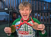 10 December 2023; Nicholas Griggs of Ireland celebrates with his team gold medal and individual bronze medal for the U20 men's 5000m during the SPAR European Cross Country Championships at Laeken Park in Brussels, Belgium. Photo by Sam Barnes/Sportsfile