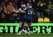 10 December 2023; Jordan Larmour of Leinster celebrates with Harry Byrne, Jimmy O'Brien and Garry Ringrose after scoring his side's first try during the Investec Champions Cup match between La Rochelle and Leinster at Stade Marcel Deflandre in La Rochelle, France. Photo by Harry Murphy/Sportsfile
