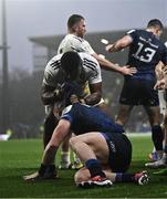 10 December 2023; Dan Sheehan of Leinster and Jonathan Danty of La Rochelle tussle during the Investec Champions Cup match between La Rochelle and Leinster at Stade Marcel Deflandre in La Rochelle, France. Photo by Harry Murphy/Sportsfile