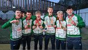 10 December 2023; Ireland athletes, from left, Harry Colbert, Jonas Stafford, Nicholas Griggs, Seamus Robinson, Shane Brosnan and Niall Murphy celebrate with their medals after Ireland won team gold in the U20 men's 5000m, Griggs also won individual bronze, during the SPAR European Cross Country Championships at Laeken Park in Brussels, Belgium. Photo by Sam Barnes/Sportsfile