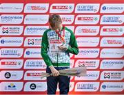 10 December 2023; Nicholas Griggs of Ireland on the podium with his bronze medal after finishing third in the U20 men's 5000m during the SPAR European Cross Country Championships at Laeken Park in Brussels, Belgium. Photo by Sam Barnes/Sportsfile