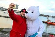 10 December 2023; Ciaran O'Dea from Dungarvan, Waterford, with the Polar Plunge bear during The Dungarvan Polar Plunge get “Freezin’ for a Reason” event to raise funds for Special Olympics Ireland athletes sponsored by Gala Retail at Dungarvan Beach in Waterford. Photo by Eóin Noonan/Sportsfile