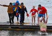 10 December 2023; Pictured at the Dungarvan Polar Plunge is Joe Kelly from Dungarvan in Waterford, left, which saw participants get “Freezin’ for a Reason” to raise funds for Special Olympics Ireland athletes in an event sponsored by Gala Retail at Dungarvan Beach in Waterford. Photo by Eóin Noonan/Sportsfile