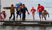 10 December 2023; Pictured at the Dungarvan Polar Plunge is Joe Kelly from Dungarvan in Waterford, left, which saw participants get “Freezin’ for a Reason” to raise funds for Special Olympics Ireland athletes in an event sponsored by Gala Retail at Dungarvan Beach in Waterford. Photo by Eóin Noonan/Sportsfile