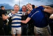 10 December 2023; Brian Hurley, left, and Damien Cahalane of Castlehaven, who stood in goal for the penalty shoot out, celebrate after the AIB Munster GAA Football Senior Club Championship Final match between Dingle, Kerry, and Castlehaven, Cork, at TUS Gaelic Grounds in Limerick. Photo by Brendan Moran/Sportsfile