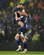 10 December 2023; Ciarán Frawley of Leinster celebrates with teammate Jamison Gibson-Park, left, after kicking the game winning penalty during the Investec Champions Cup match between La Rochelle and Leinster at Stade Marcel Deflandre in La Rochelle, France. Photo by Harry Murphy/Sportsfile