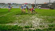 10 December 2023; Johnny O'Regan of Castlehaven gathers possession on a very wet pitch during the AIB Munster GAA Football Senior Club Championship Final match between Dingle, Kerry, and Castlehaven, Cork, at TUS Gaelic Grounds in Limerick. Photo by Brendan Moran/Sportsfile