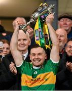 10 December 2023; Glen captain Connor Carville lifts the trophy after the AIB Ulster GAA Football Senior Club Championship Final match between Glen of Derry, and Scotstown of Monaghan, at BOX-IT Athletic Grounds in Armagh. Photo by Ramsey Cardy/Sportsfile