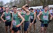 10 December 2023; Ireland athletes, from left, Cormac Dalton, Keelan Kilrehill, Hugh Armstrong and Fearghal Curtin after Team Ireland finished fourth in the senior men's 9000m during the SPAR European Cross Country Championships at Laeken Park in Brussels, Belgium. Photo by Sam Barnes/Sportsfile