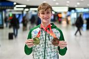 11 December 2023; Ireland’s European Cross Country Team returning to Dublin Airport this morning following another hugely successful competition in Brussels yesterday. The returning team including U20 men's 5000m team Gold medallist and individual bronze medallist Nicholas Griggs. Photo by Ben McShane/Sportsfile