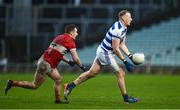 10 December 2023; Damien Cahalane of Castlehaven in action against Tom O'Sullivan of Dingle during the AIB Munster GAA Football Senior Club Championship Final match between Dingle, Kerry, and Castlehaven, Cork, at TUS Gaelic Grounds in Limerick. Photo by Brendan Moran/Sportsfile