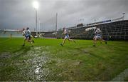 10 December 2023; The Castlehaven team run onto the pitch for the second half of the AIB Munster GAA Football Senior Club Championship Final match between Dingle, Kerry, and Castlehaven, Cork, at TUS Gaelic Grounds in Limerick. Photo by Brendan Moran/Sportsfile