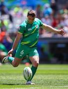 9 December 2023; Billy Dardis of Ireland kicks the ball during the Men's Pool A match between Ireland and Great Britain during the HSBC SVNS Rugby Tournament at DHL Stadium in Cape Town, South Africa. Photo by Shaun Roy/Sportsfile