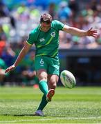 9 December 2023; Billy Dardis of Ireland kicks the ball during the Men's Pool A match between Ireland and Great Britain during the HSBC SVNS Rugby Tournament at DHL Stadium in Cape Town, South Africa. Photo by Shaun Roy/Sportsfile