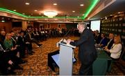 9 December 2023; Newly elected FAI president Paul Cooke addresses the assembly during the annual general meeting of the Football Association of Ireland at the Radisson Blu St. Helen's Hotel in Dublin. Photo by Stephen McCarthy/Sportsfile