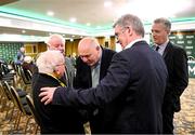 9 December 2023; Outgoing FAI president Gerry McAnaney speaks to former Republic of Ireland kit manager Charlie O'Leary in the company of his son John, left, with FAI chairperson nominee Tony Keohane and FAI chief executive Jonathan Hill, right, before the annual general meeting of the Football Association of Ireland at the Radisson Blu St. Helen's Hotel in Dublin. Photo by Stephen McCarthy/Sportsfile