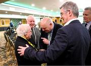 9 December 2023; Outgoing FAI president Gerry McAnaney speaks to former Republic of Ireland kit manager Charlie O'Leary in the company of his son John, left, with FAI chairperson nominee Tony Keohane and FAI chief executive Jonathan Hill, right, before the annual general meeting of the Football Association of Ireland at the Radisson Blu St. Helen's Hotel in Dublin. Photo by Stephen McCarthy/Sportsfile