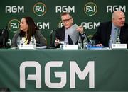 9 December 2023; FAI chief executive Jonathan Hill, centre, with outgoing FAI president Gerry McAnaney and FAI board member Niamh O’Mahony during an extraordinary general meeting in advance of the Football Association of Ireland's annual general meeting at the Radisson Blu St. Helen's Hotel in Dublin. Photo by Stephen McCarthy/Sportsfile