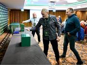 9 December 2023; Delegate Dave Cassin casts his vote during an extraordinary general meeting in advance of the Football Association of Ireland's annual general meeting at the Radisson Blu St. Helen's Hotel in Dublin. Photo by Stephen McCarthy/Sportsfile