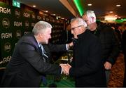 9 December 2023; Newly elected FAI president Paul Cooke is congratulated by Shay Weafer during the annual general meeting of the Football Association of Ireland at the Radisson Blu St. Helen's Hotel in Dublin. Photo by Stephen McCarthy/Sportsfile