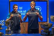 11 December 2023; Leinster players Fintan Gunne and Tommy O'Brien draw Cistercian College, Roscrea, and Blackrock College in the Junior Cup first round during the Bank of Ireland Leinster School's Cup Draw at Bank of Ireland Montrose Branch in Dublin. Photo by Harry Murphy/Sportsfile