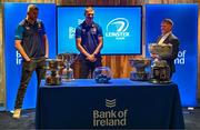 11 December 2023; Leinster players Ross Molony and Sam Prendergast in conversation with Senior communications & media manager Marcus Ó Buachalla during the Bank of Ireland Leinster School's Cup Draw at Bank of Ireland Montrose Branch in Dublin. Photo by Harry Murphy/Sportsfile