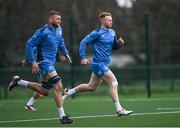 12 December 2023; Ciarán Frawley, right, and Ross Molony during a Leinster Rugby squad training session at UCD in Dublin. Photo by Harry Murphy/Sportsfile