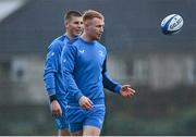 12 December 2023; Ciarán Frawley, right, and Sam Prendergast during a Leinster Rugby squad training session at UCD in Dublin. Photo by Harry Murphy/Sportsfile