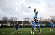 12 December 2023; Jack Conan is lifted in a lineout by Andrew Porter and Thomas Clarkson during a Leinster Rugby squad training session at UCD in Dublin. Photo by Harry Murphy/Sportsfile