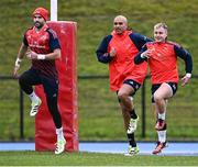 13 December 2023; Players, from left, Conor Murray, Simon Zebo and Craig Casey during Munster rugby squad training at University of Limerick in Limerick. Photo by Piaras Ó Mídheach/Sportsfile