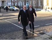 13 December 2023; Former FAI chairperson Roy Barrett, left, and FAI chief operating officer David Courell arrive at Dáil Éireann in Dublin ahead of a meeting with the Oireachtas Committee on Tourism, Culture, Arts, Sport and Media. Photo by David Fitzgerald/Sportsfile