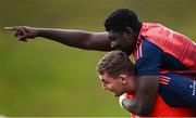 13 December 2023; Edwin Edogbo, top, with Darragh McSweeney during Munster rugby squad training at University of Limerick in Limerick. Photo by Piaras Ó Mídheach/Sportsfile