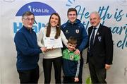 14 December 2023; Ballinderreene, Galway, representatives Claire Walsh and Gary Reinford is presented their Silver Healthy Club award by Connacht GAA secretary John Prenty, left, and Connacht GAA Council president John Murphy, right, during the Irish Life Connacht GAA Healthy Clubs recognition event at the Connacht GAA Centre of Excellence in Bekan, Mayo. Photo by Ben McShane/Sportsfile