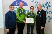 14 December 2023; Eslin, Leitrim, representatives Sean Reynolds and Lisa Mulligan is presented their Silver Healthy Club award by Connacht GAA secretary John Prenty, left, and Connacht GAA Council president John Murphy, right, during the Irish Life Connacht GAA Healthy Clubs recognition event at the Connacht GAA Centre of Excellence in Bekan, Mayo. Photo by Ben McShane/Sportsfile