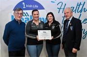 14 December 2023; Tuar Mhic Éadaigh, Mayo, representatives Siobhan Masterson and Michelle Lally is presented their Silver Healthy Club award by Connacht GAA secretary John Prenty, left, and Connacht GAA Council president John Murphy, right, during the Irish Life Connacht GAA Healthy Clubs recognition event at the Connacht GAA Centre of Excellence in Bekan, Mayo. Photo by Ben McShane/Sportsfile