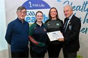 14 December 2023; Ballina Stephnites, Mayo, representatives Fran Downey and Maisie McKeever is presented their Foundation Healthy Club award by Connacht GAA secretary John Prenty, left, and Connacht GAA Council president John Murphy, right, during the Irish Life Connacht GAA Healthy Clubs recognition event at the Connacht GAA Centre of Excellence in Bekan, Mayo. Photo by Ben McShane/Sportsfile