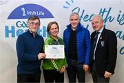 14 December 2023; Hollymount-Carramore, Mayo, representatives Breda McCartan and Matthew Gill is presented their Foundation Healthy Club award by Connacht GAA secretary John Prenty, left, and Connacht GAA Council president John Murphy, right, during the Irish Life Connacht GAA Healthy Clubs recognition event at the Connacht GAA Centre of Excellence in Bekan, Mayo. Photo by Ben McShane/Sportsfile