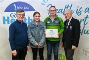 14 December 2023; Roscommon Gaels, Roscommon, representatives Aoibhe Mulry and Sean Mulry is presented their Silver Healthy Club award by Connacht GAA secretary John Prenty, left, and Connacht GAA Council president John Murphy, right, during the Irish Life Connacht GAA Healthy Clubs recognition event at the Connacht GAA Centre of Excellence in Bekan, Mayo. Photo by Ben McShane/Sportsfile