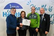 14 December 2023; St Aiden's, Roscommon, representatives Mary Owens and Stephen Harney is presented their Silver Healthy Club award by Connacht GAA secretary John Prenty, left, and Connacht GAA Council president John Murphy, right, during the Irish Life Connacht GAA Healthy Clubs recognition event at the Connacht GAA Centre of Excellence in Bekan, Mayo. Photo by Ben McShane/Sportsfile