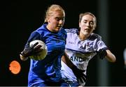 7 December 2023; Amy O'Leary of UCD and Neve Landon of UL during the 3rd Level Ladies Football League Division 2 final match between UCD and Ulster University at Dundalk Institute of Technology in Dundalk, Louth. Photo by Ben McShane/Sportsfile