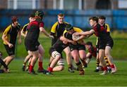 14 December 2023; Aaron Donnelly of Patricians Secondary School, Newbridge is tackled by Alex Downey of Kildare Town CS during the Division 3A SCT Development Shield final match between Patricians Secondary School, Newbridge and Kildare Town CS at Energia Park in Dublin. Photo by Stephen Marken/Sportsfile